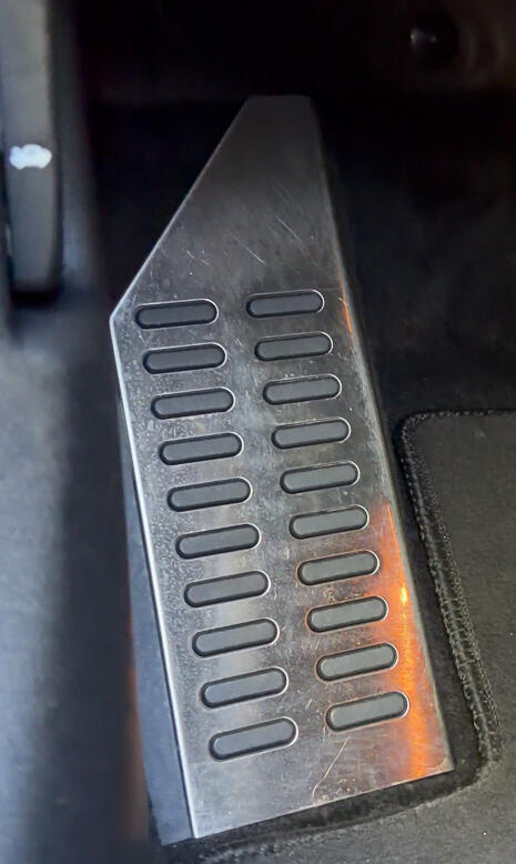 Deep cleaned car interior showing a spotless aluminum accelerator pedal and clean floor mat in Royersford.